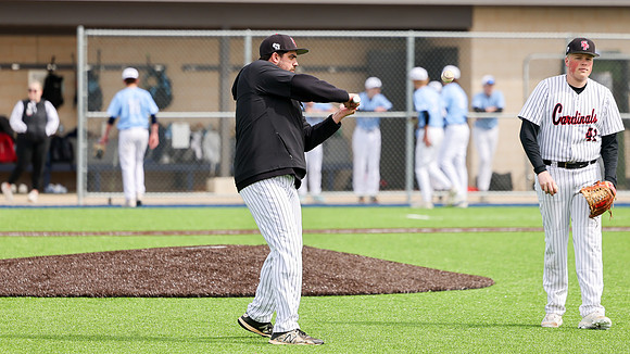 Coach Xander Helton (13)