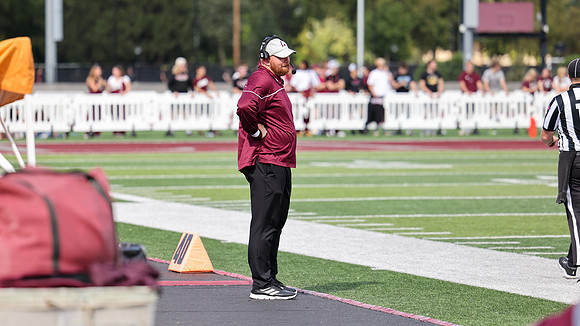 Coach Andrew McGlenn (8)