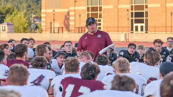 Coach Matt Janus (12)