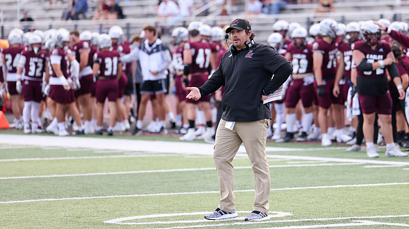 Coach Matt Janus (25)