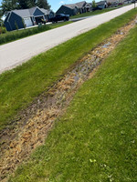 Garvey 5343 Buttke ct Drainage Issues on the Hayfield Street Side of Property