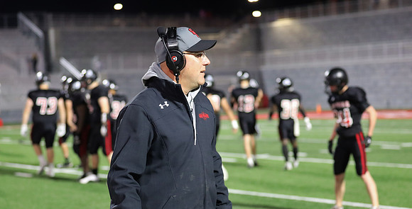 Coach Aaron Buss (8)