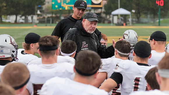 Coach Mike Anderson (9)