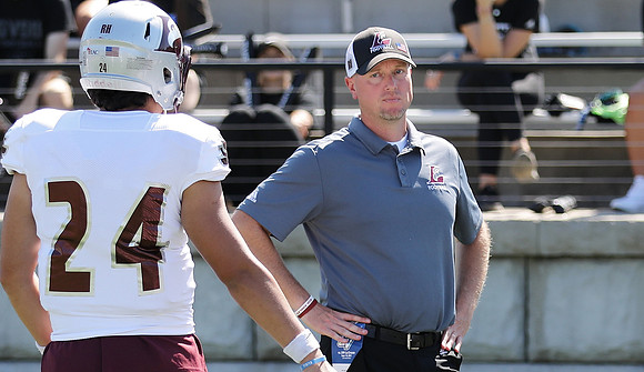 COACH Michael McGuire (7)