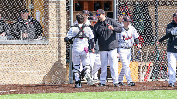 Coach Xander Helton (5)