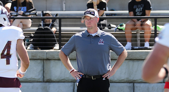 COACH Michael McGuire (9)