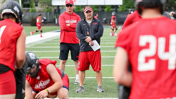 Coach Brian Kaminski (12)