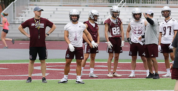 Coach Michael McGuire (8)