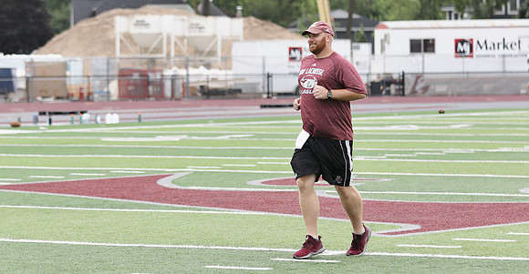 Coach Andrew McGlenn (9)