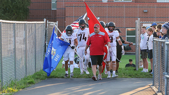 Coach Brian Kaminski (12)