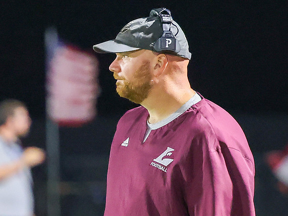 Coach Andrew McGlenn (8)
