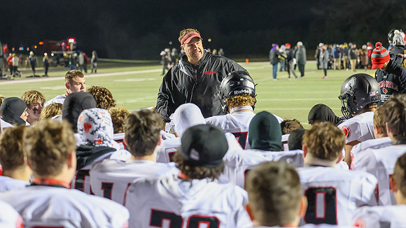 Coach Brian Kaminski (13)