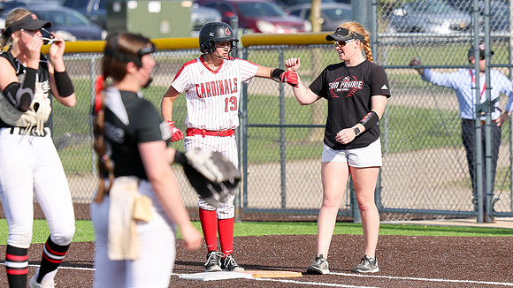 Coach Alyssa Achenreiner (9)