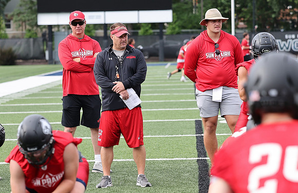 Coach Brian Kaminski (13)