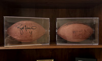 ($1600.00) Item #50 Reggie White & Brett Favre Autographed Super Bowl XXXI Footballs Each In a Case