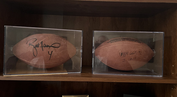 ($1600.00) Item #50 Reggie White & Brett Favre Autographed Super Bowl XXXI Footballs Each In a Case