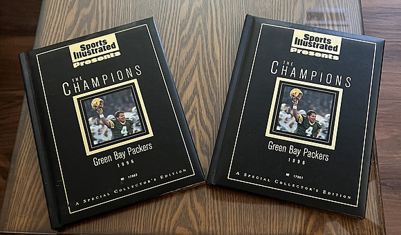 ($50.00) Item #127 2 Copies Sports Illustrated Special Collectors Edition Number 17903 Soft Cover Book, Brett Favre Cover. The Champions Green Bay Packers 1996  Number 17903 (3)