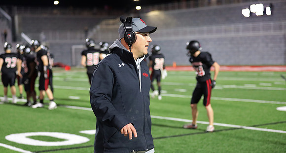 Coach Aaron Buss (10)
