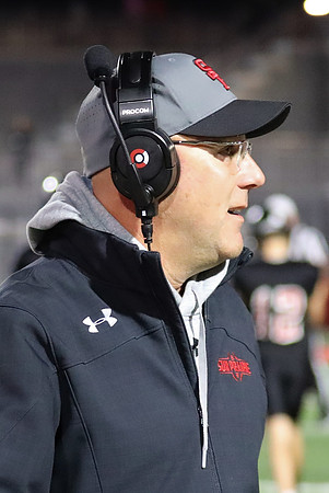 Coach Aaron Buss (9)