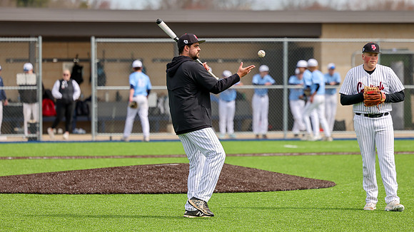 Coach Xander Helton (11)