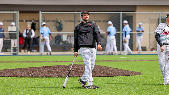 Coach Xander Helton (18)