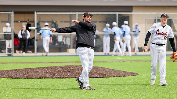 Coach Xander Helton (15)