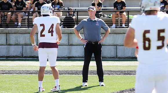 COACH Michael McGuire (8)