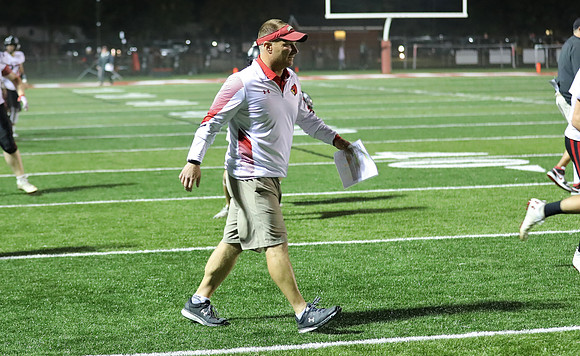 Coach Brian Kaminski (32)
