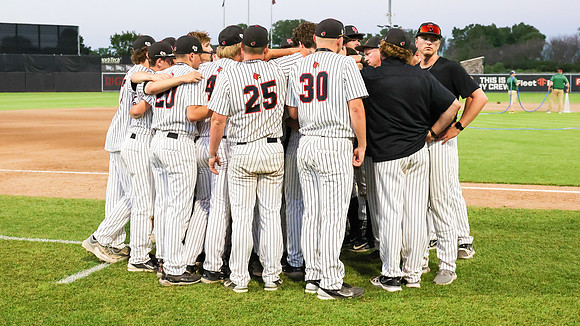 Coach Justin Krebs (28)