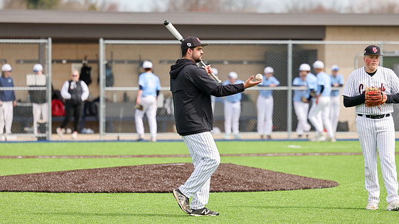 Coach Xander Helton (10)