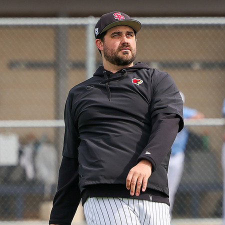 Coach Xander Helton (16)